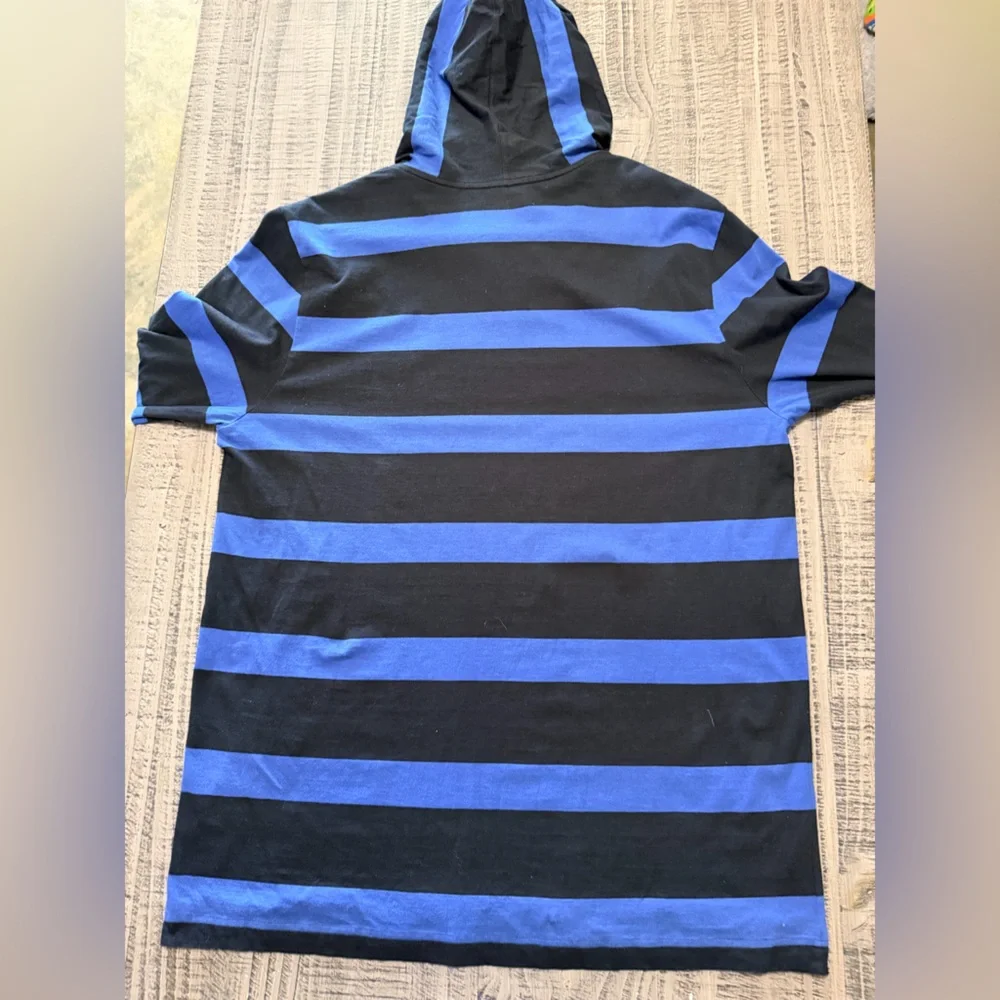 Lacoste Black and Blue Striped Polo Dress - Picture 7 of 7